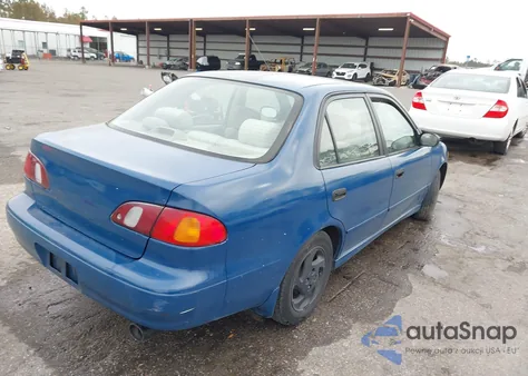 1999 Toyota Corolla Le z USA, uszkodzony, nr VIN 2T1BR12E9XC232710